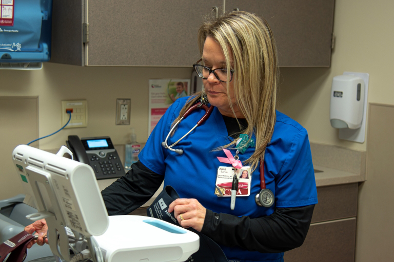 April Carter working with a medical cart