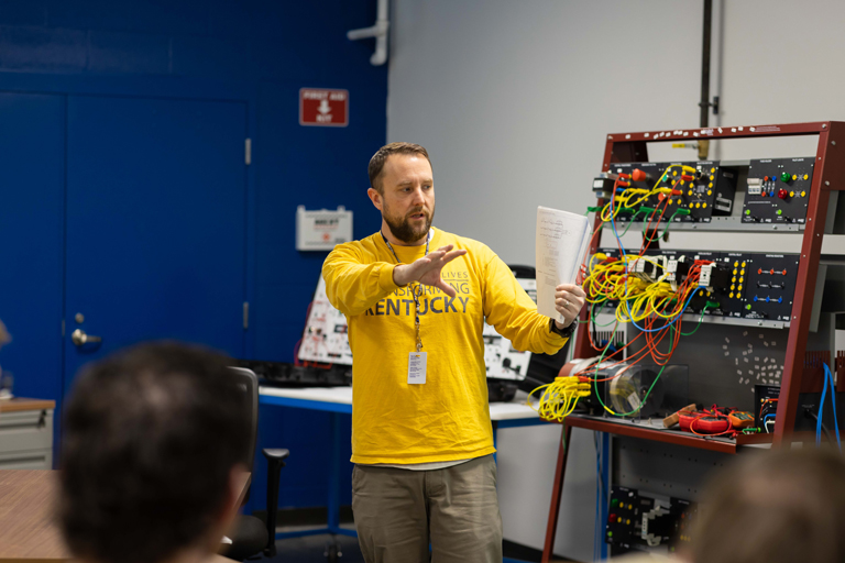 instructor teaching electrical technology students