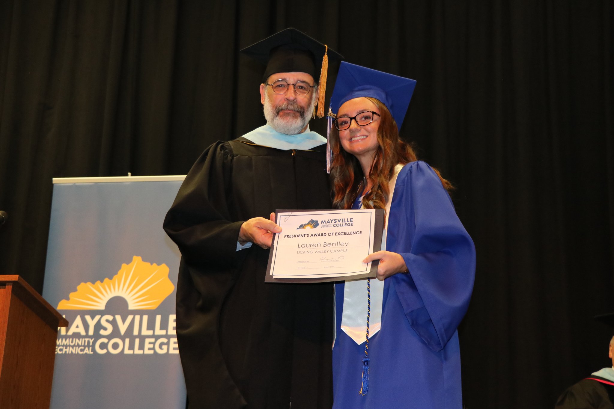 President's Award of Excellence Recipient Bently at graduation.