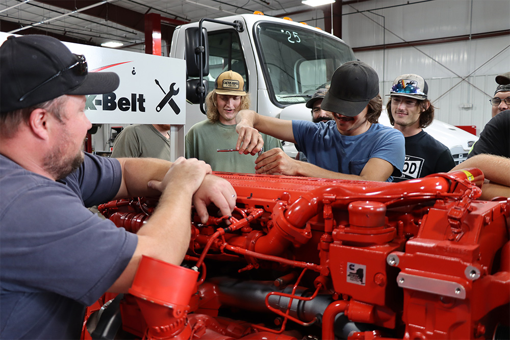 Student starting to work on new engine in Diesel Technology lab.