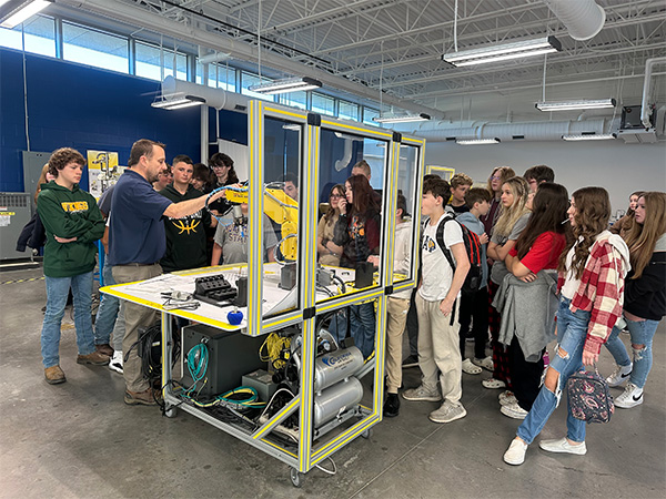 Brandin Perkins in robotics lab with Rowan County Middle School students.
