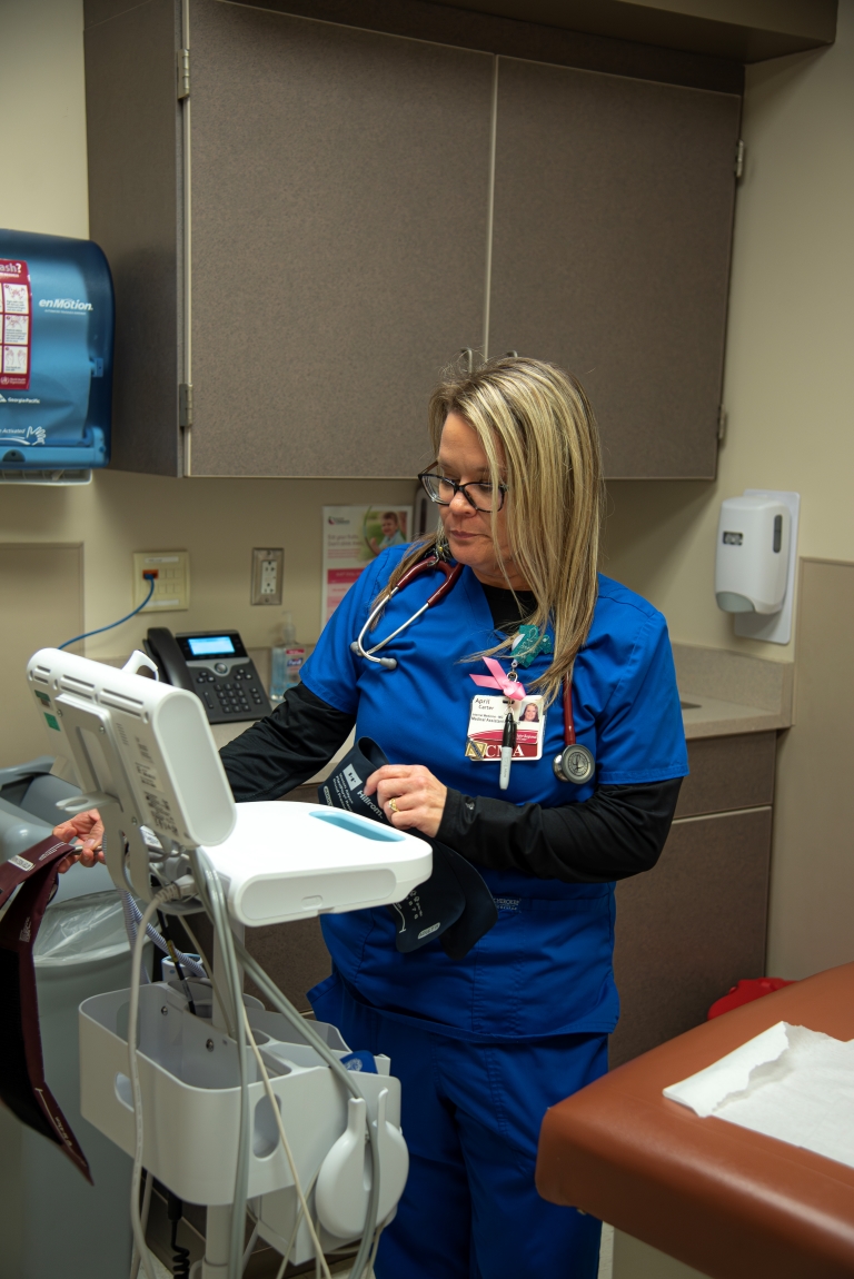 April Carter working with a medical cart