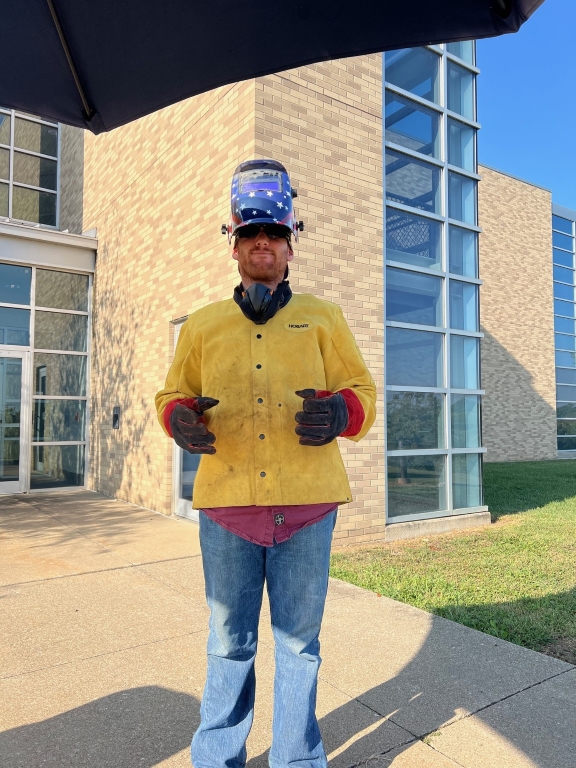 Jonathon Miller wearing welding gear