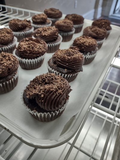 cupcakes being sold at the bakery