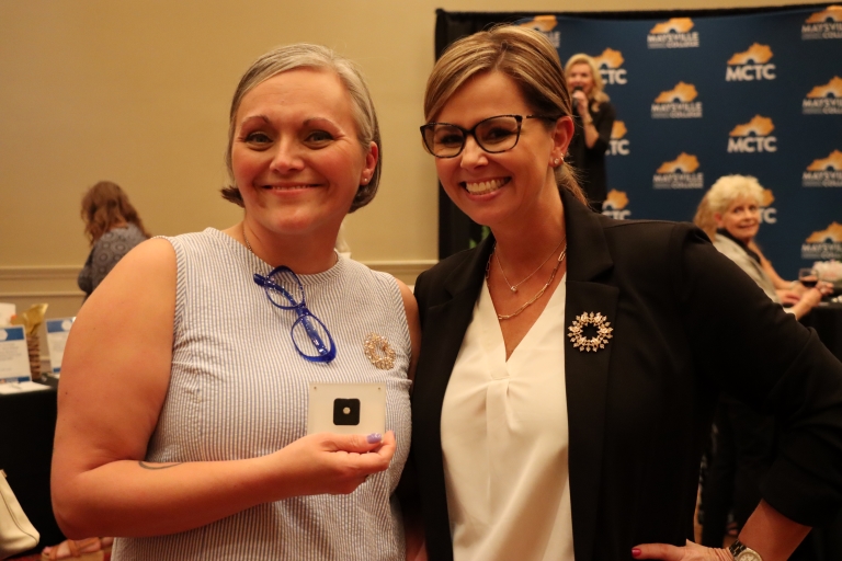 two women at the WWJM event