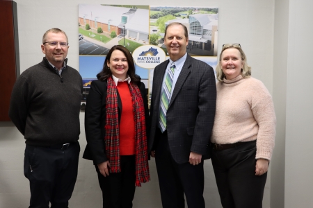 man, two new board members, and the MCTC President